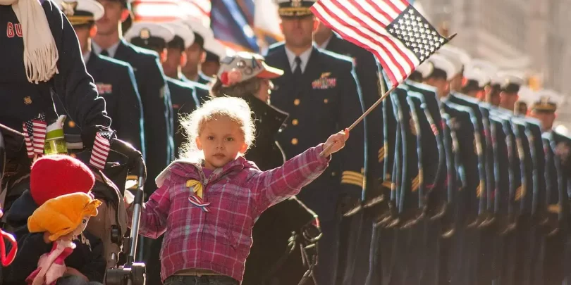 Thank you for your service! Image of U.S. Coast Guard families and service members in New York City Veterans Day Parade